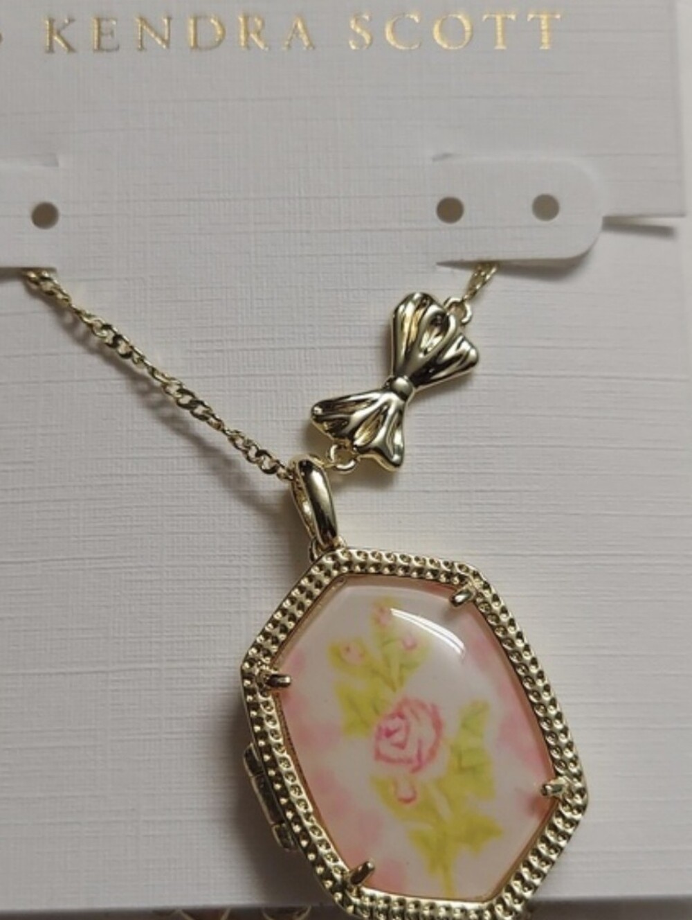 Kendra Scott Gold Bow Locket Necklace with Pink Floral Inset